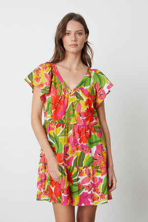 Maeve Tiered Dress in bold floral aloha print with reds, hot pinks and greens front