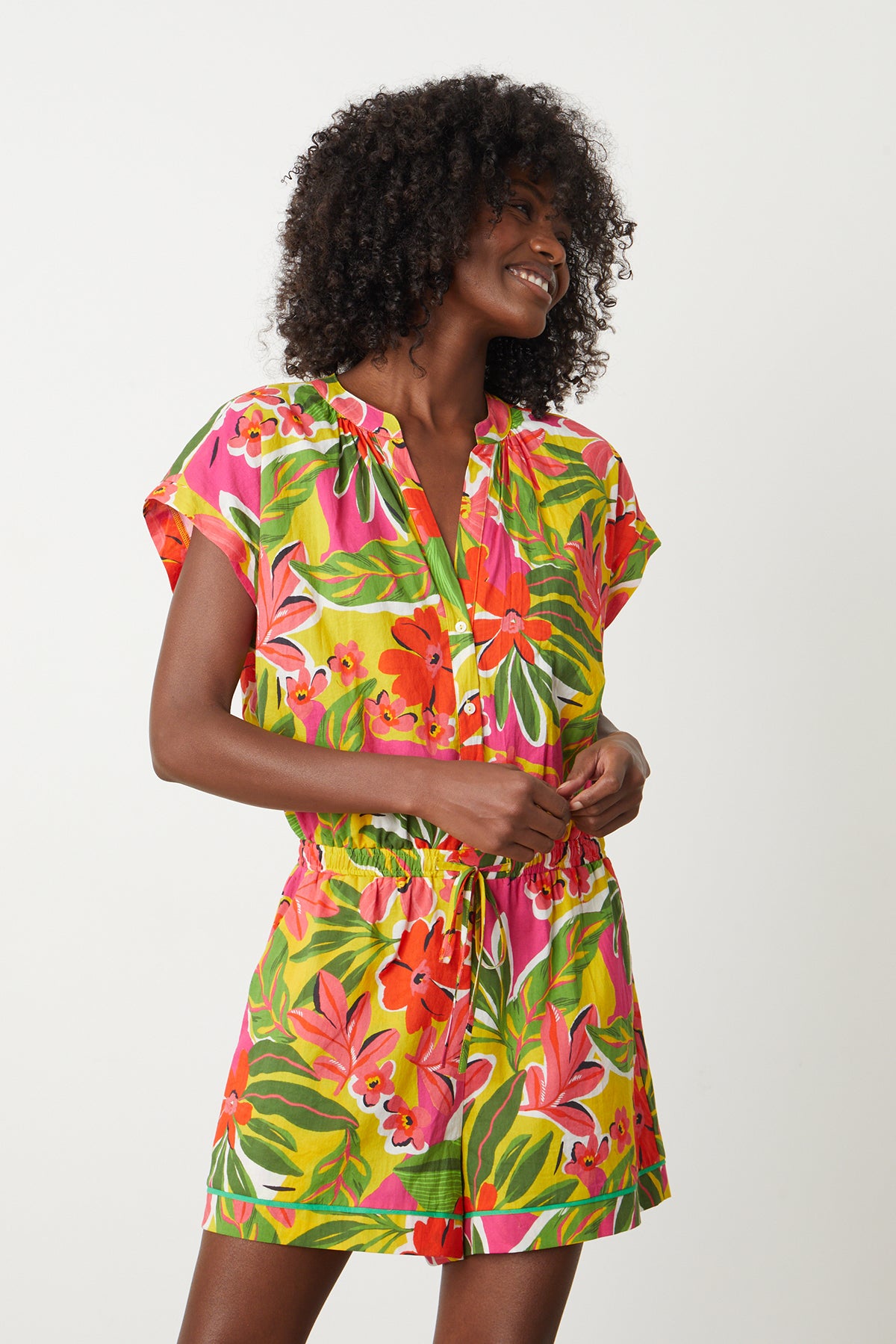 Pam Romper in bold floral aloha print with reds, hot pinks and greens front-26462109925569
