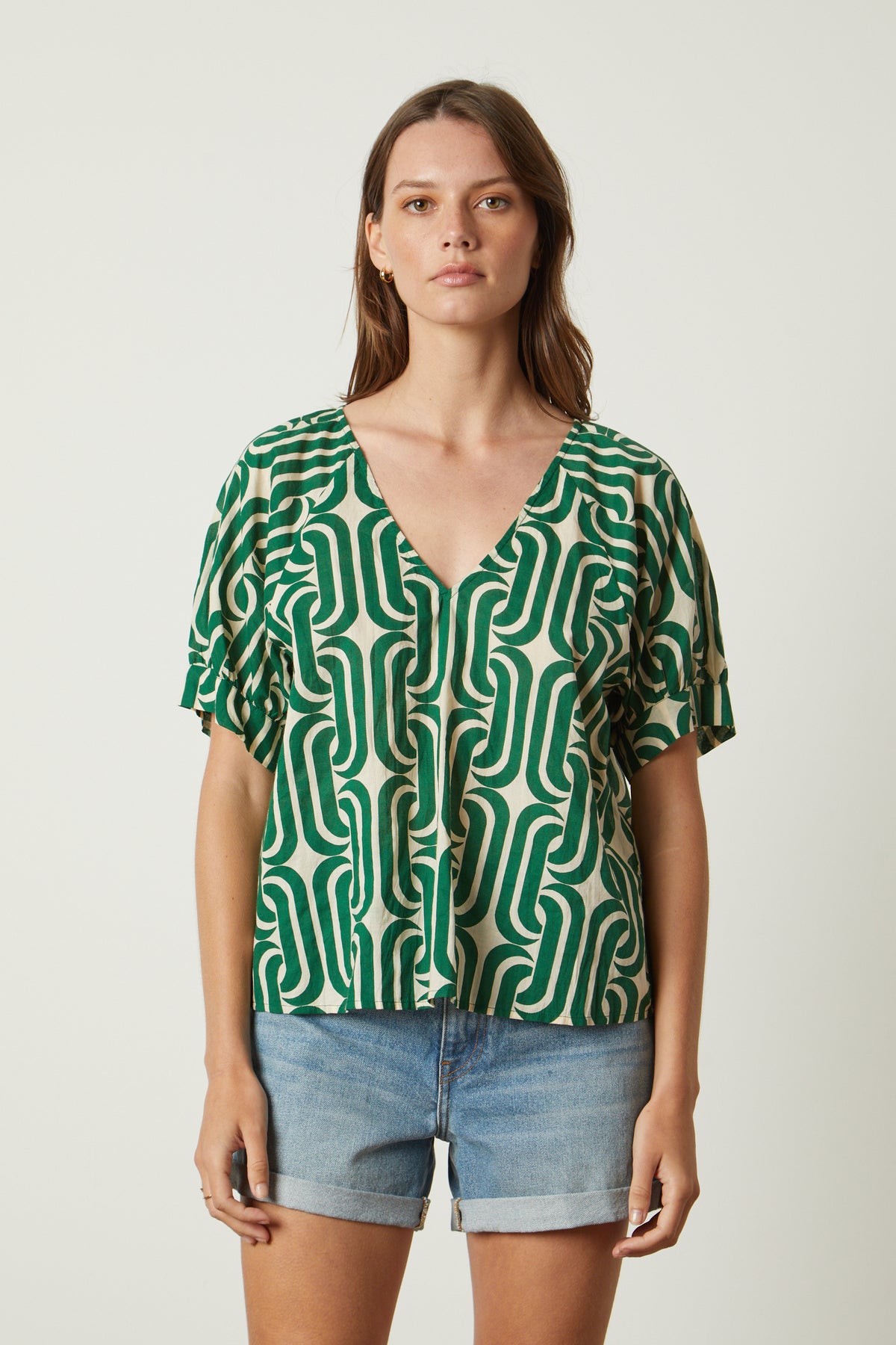 a woman wearing shorts and a Velvet by Graham & Spencer JODY PRINTED TOP.-26312405450945