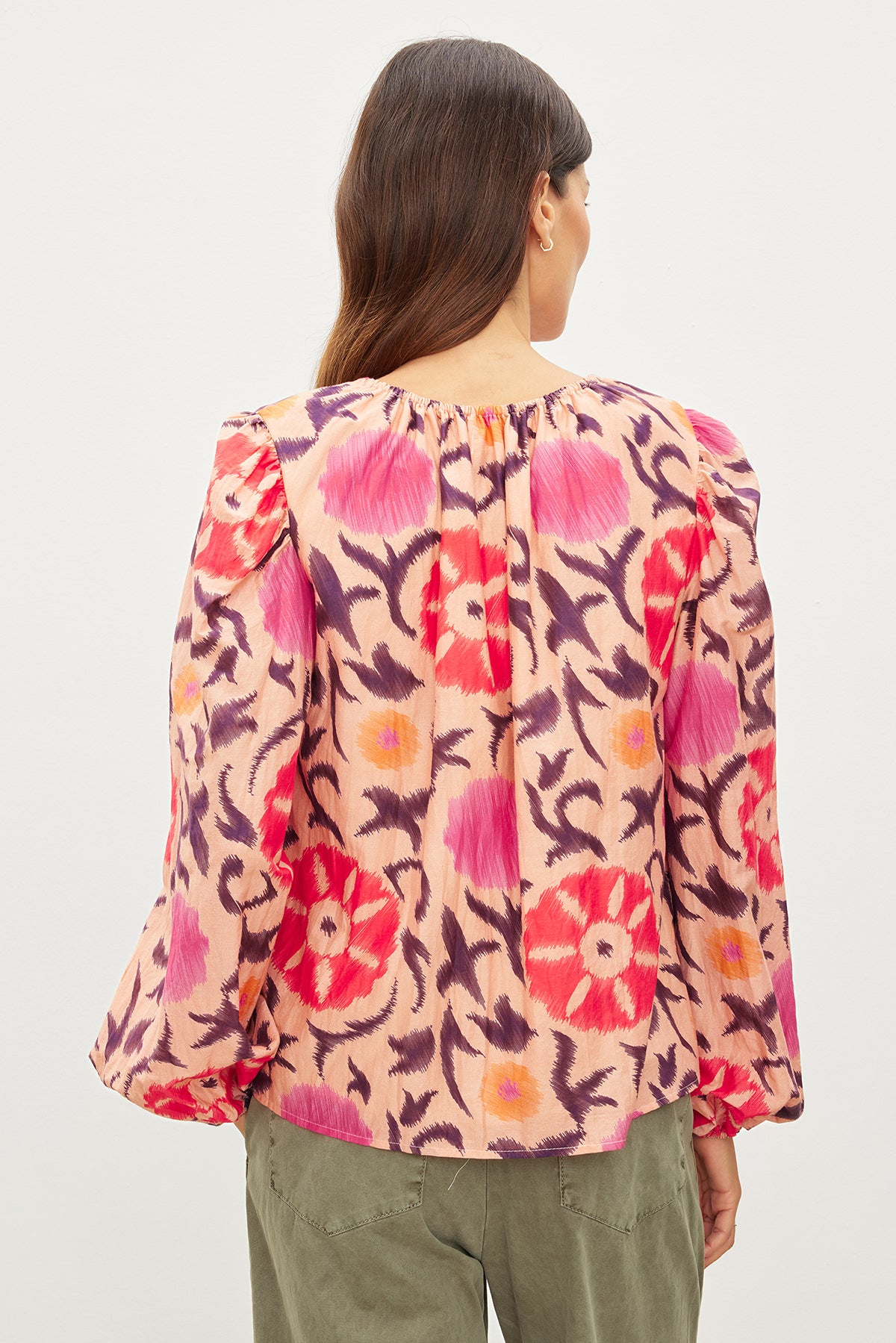   The back view of a woman wearing a Velvet by Graham & Spencer FRASER PRINTED SILK COTTON VOILE TOP. 