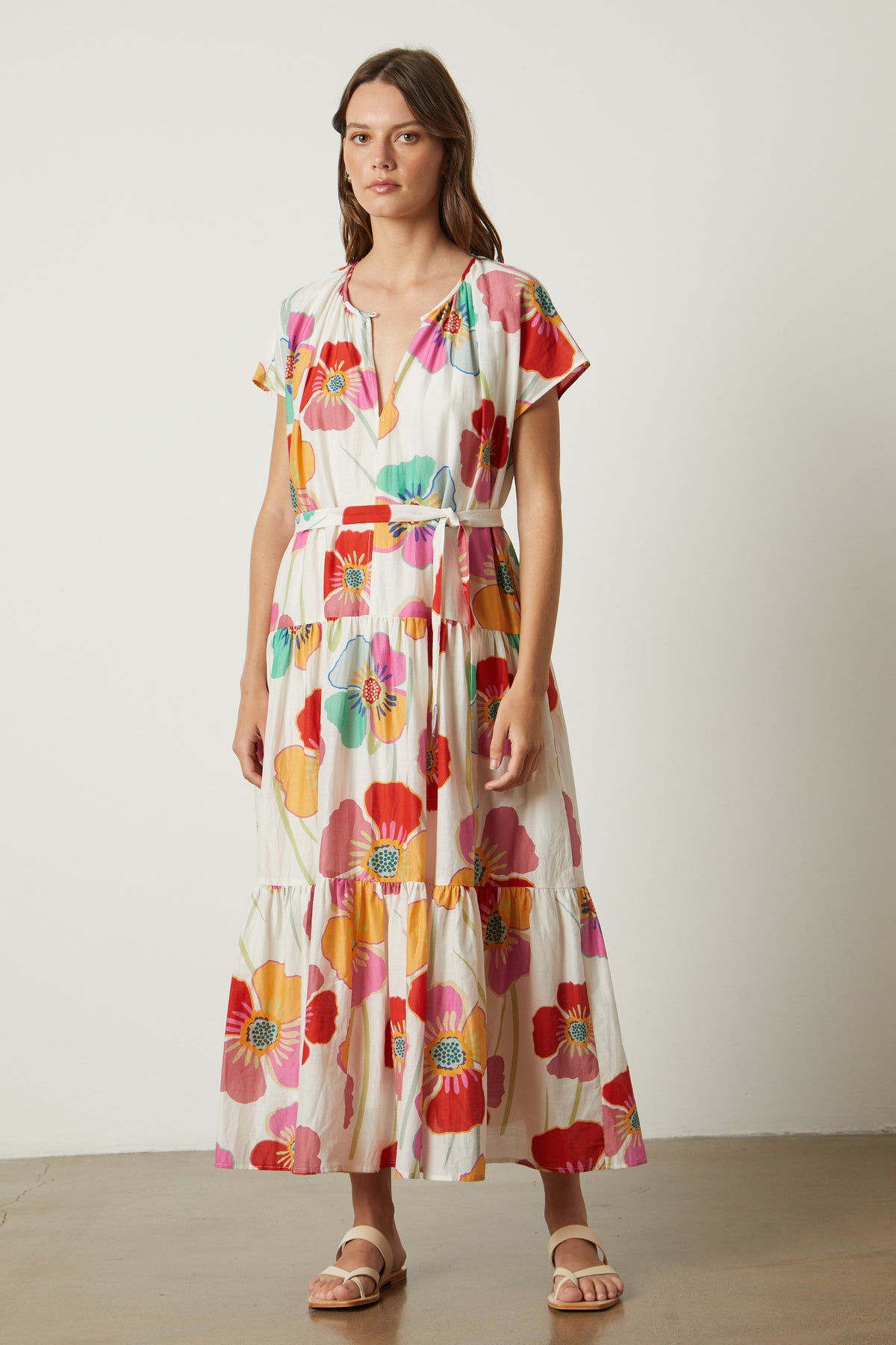 A woman wearing a Velvet by Graham & Spencer Savannah printed maxi dress.-26317107855553