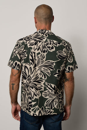 Iggy Button-Up Shirt in Catalina print with large bold black and cream abstract flower print on dark green background, with dark blue denim back