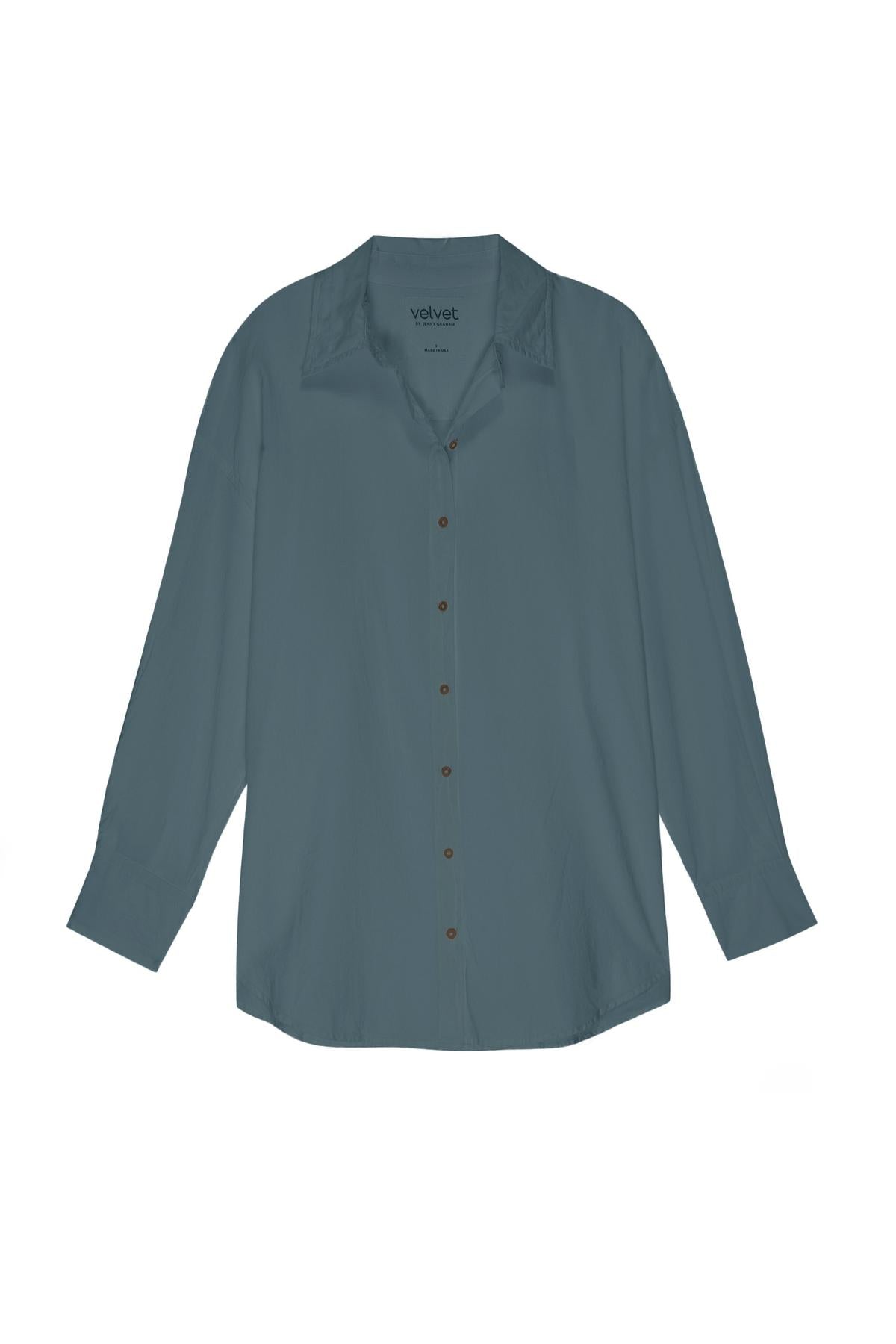   A women's Velvet by Jenny Graham REDONDO BUTTON-UP SHIRT with a drop shoulder seam and buttons down the front. 