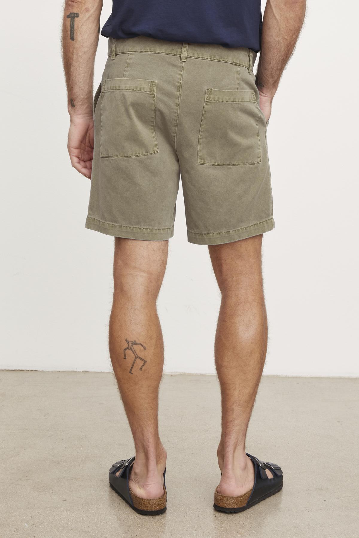 The back view of a man wearing Velvet by Graham & Spencer's RAY SANDED TWILL SHORT.-36009107816641