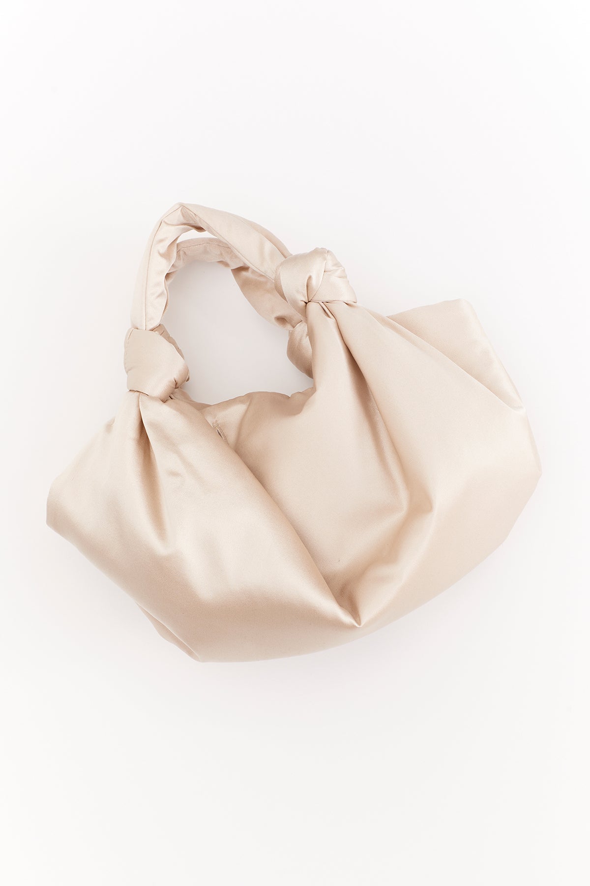   A Velvet by Jenny Graham ROBYN BAG on a white surface. 