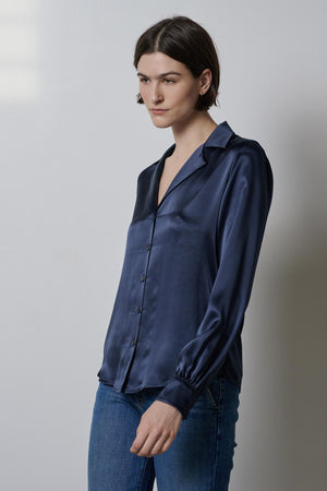 The model is wearing the Velvet by Jenny Graham SOHO TOP, a timeless button up.