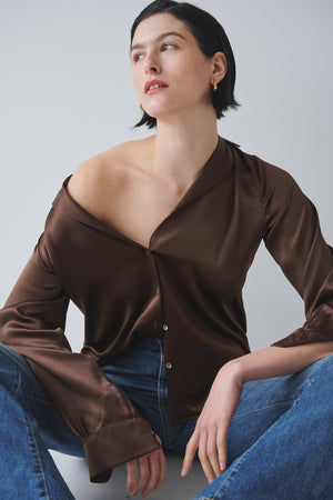 A model wearing a timeless SOHO TOP silk charmeuse blouse by Velvet by Jenny Graham.