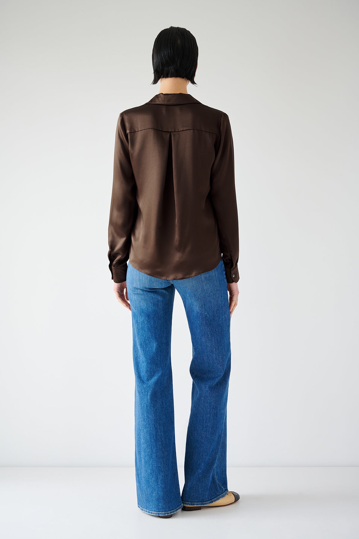 The timeless back view of a woman wearing a Velvet by Jenny Graham SOHO TOP in silk charmeuse.-35547448836289