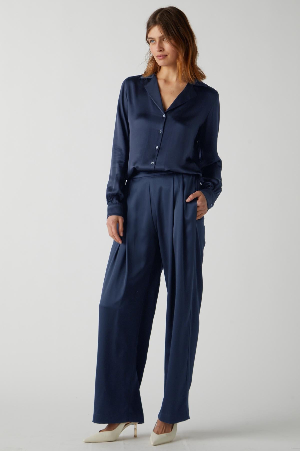 The model is wearing a Velvet by Jenny Graham MANHATTAN PANT jumpsuit for an elegant evening look.-36594676433089