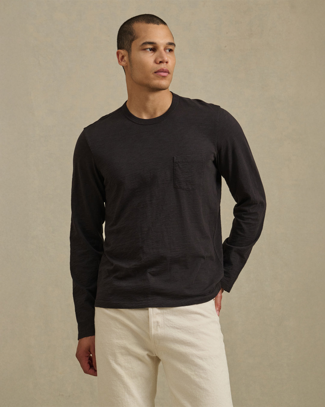A man wearing the Dalton Tee by Velvet by Graham & Spencer.