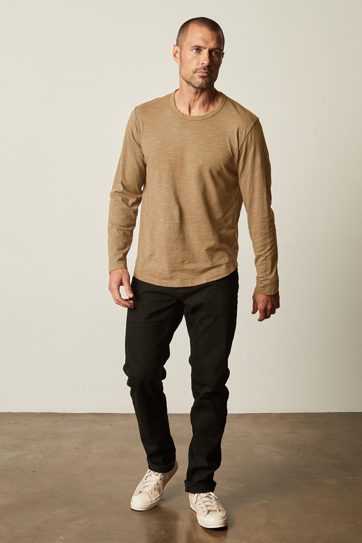   Kai Crew Neck Long Sleeve Tee in camel color with black denim full length front 