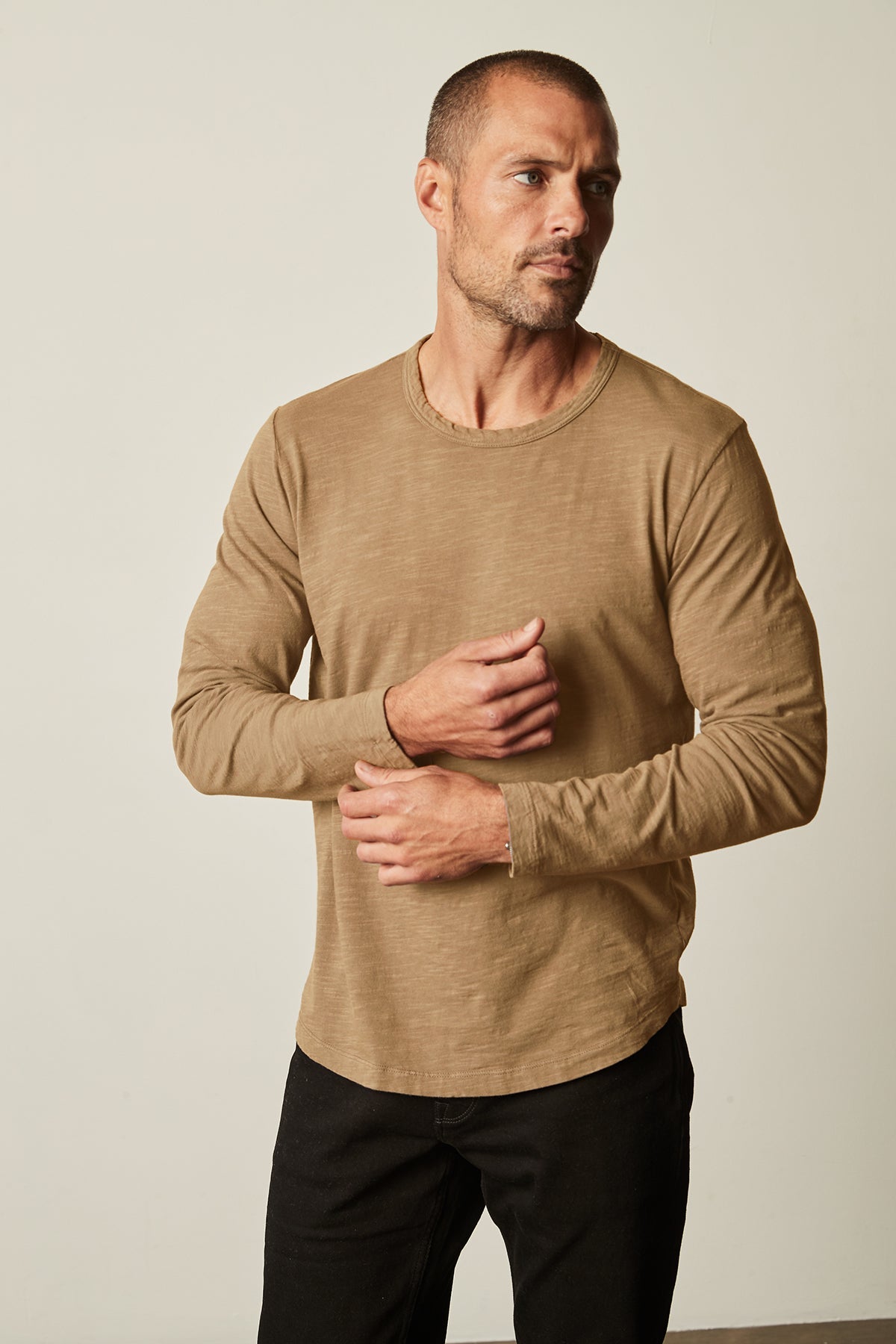 Kai Crew Neck Long Sleeve Tee in camel color with black denim front-26630571360449