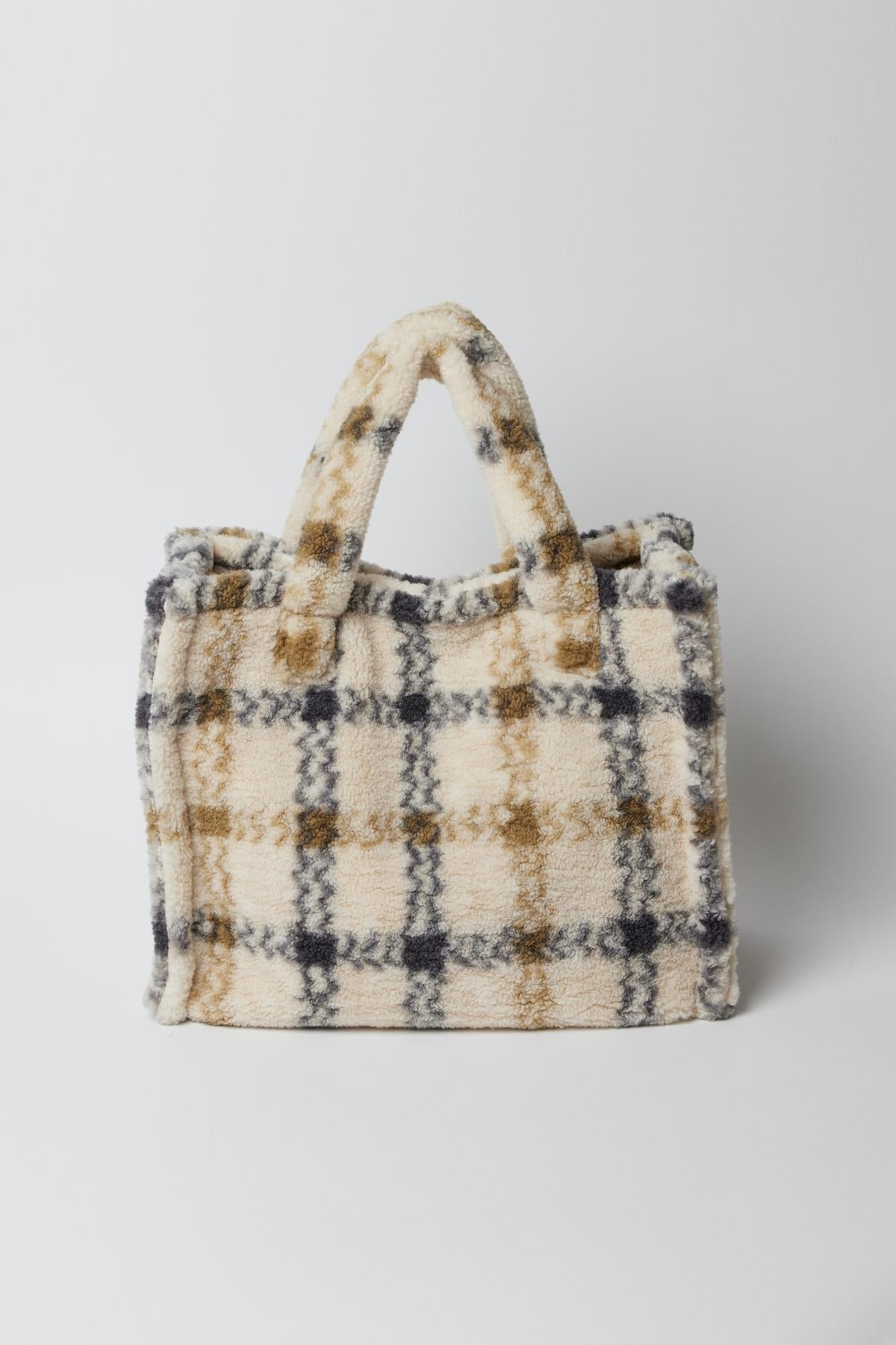   A SMALL TEDDY TOTE by Velvet by Graham & Spencer on a white surface. 