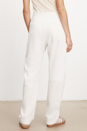 The view of a woman wearing MATTY SOFT FLEECE SWEATPANT by Velvet by Graham & Spencer.