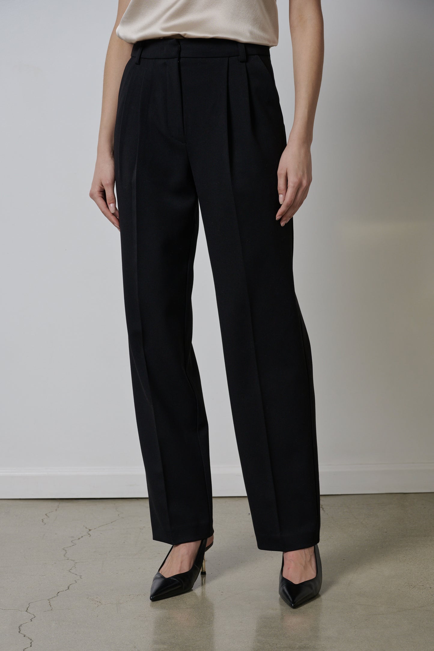 A woman wearing Velvet by Jenny Graham BUNDY PANT trousers and a blouse.-26915009626305