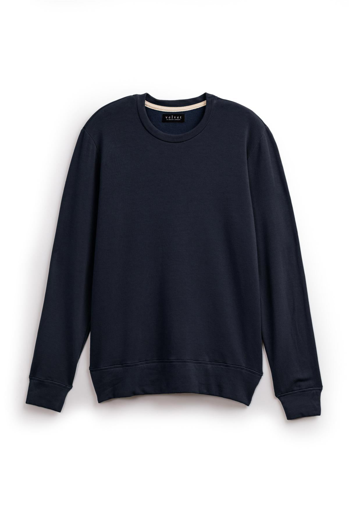   A SOREN LUXE FLEECE PULLOVER by Velvet by Graham & Spencer with a soft interior hanging on a white background. 