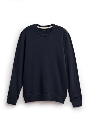 A SOREN LUXE FLEECE PULLOVER by Velvet by Graham & Spencer with a soft interior hanging on a white background.