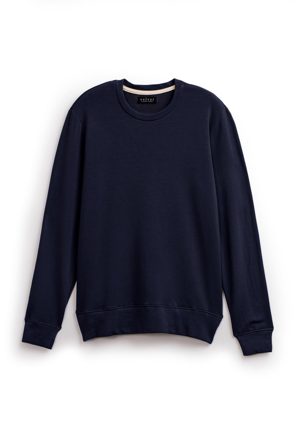   The SOREN PULLOVER, a luxurious fleece sweatshirt from Velvet by Graham & Spencer, features a plain black design with a crew neckline and long sleeves, displayed against a white background. 