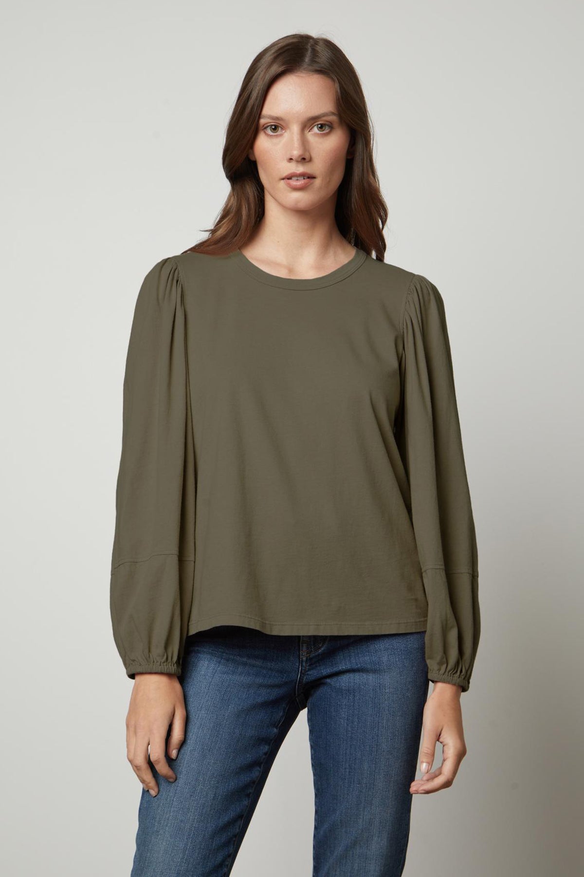 The Jetty Crew Neck Tee by Velvet by Graham & Spencer features an olive green puff sleeve top with a banded neckline and long sleeves.-35660271550657