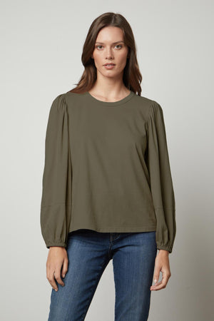 The Jetty Crew Neck Tee by Velvet by Graham & Spencer features an olive green puff sleeve top with a banded neckline and long sleeves.
