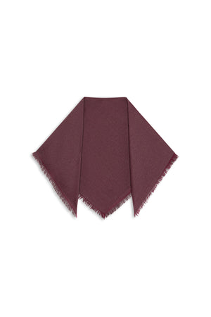 Dark maroon SUMMER CASHMERE HERRINGBONE SCARF, a square scarf with a frayed edge, folded into a triangle.