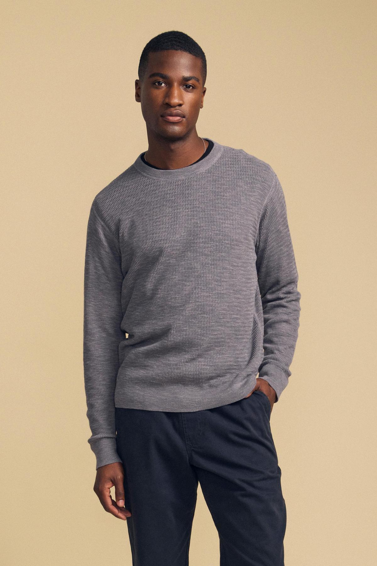A man wearing a grey CONOR SWEATER featuring a subtle horizontal ribbed texture.-46287883206849