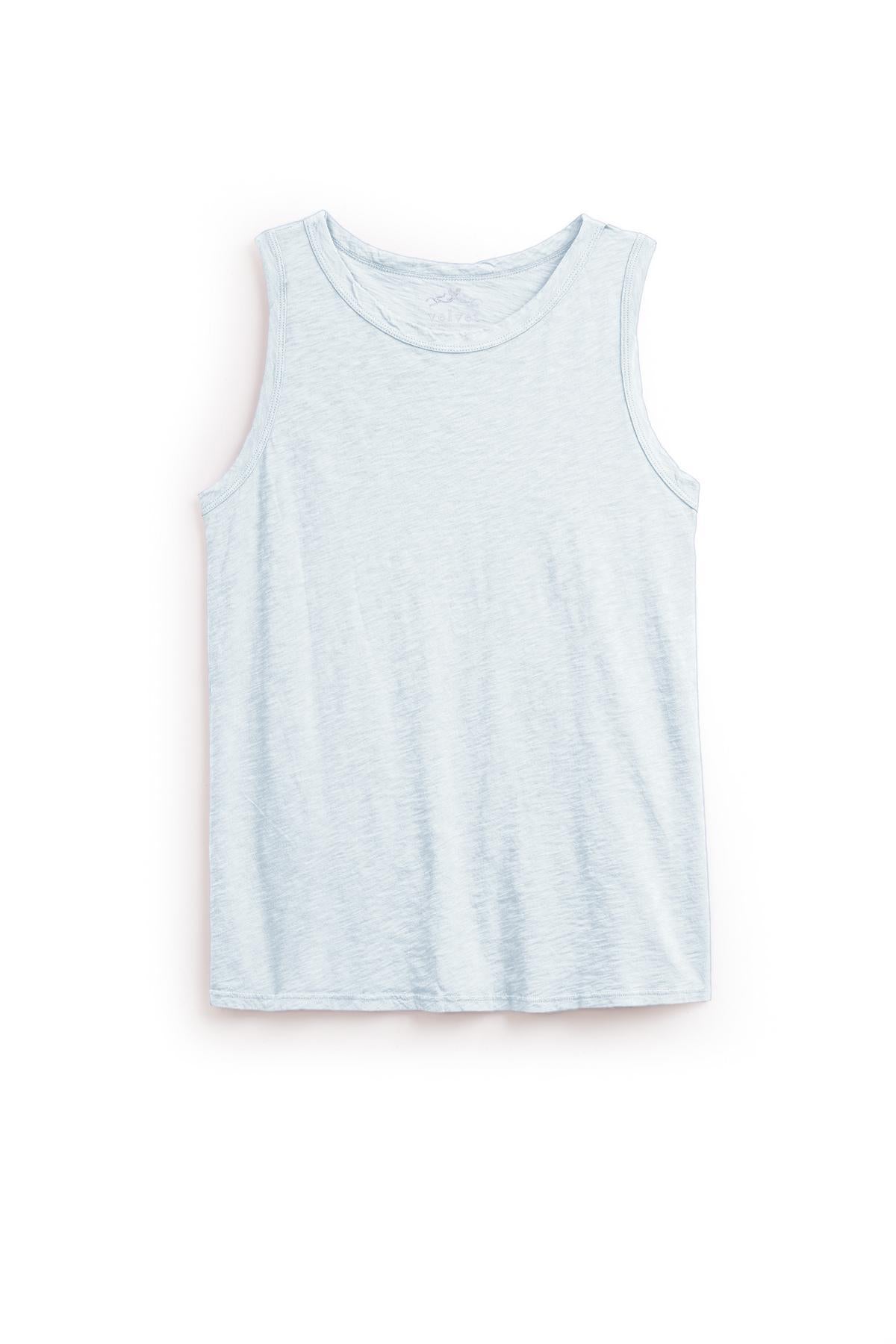   The TAURUS TANK TOP by Velvet by Graham & Spencer is a light blue sleeveless essential crafted from textured cotton slub. Featuring a classic crew neck, this top blends style and comfort perfectly, making it a must-have for any wardrobe. 