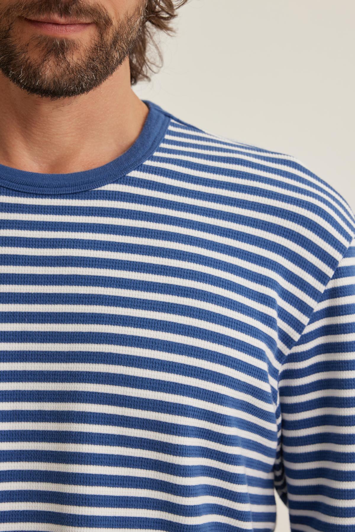   A man with a beard is shown wearing the HARLAN THERMAL STRIPED CREW by Velvet by Graham & Spencer. 