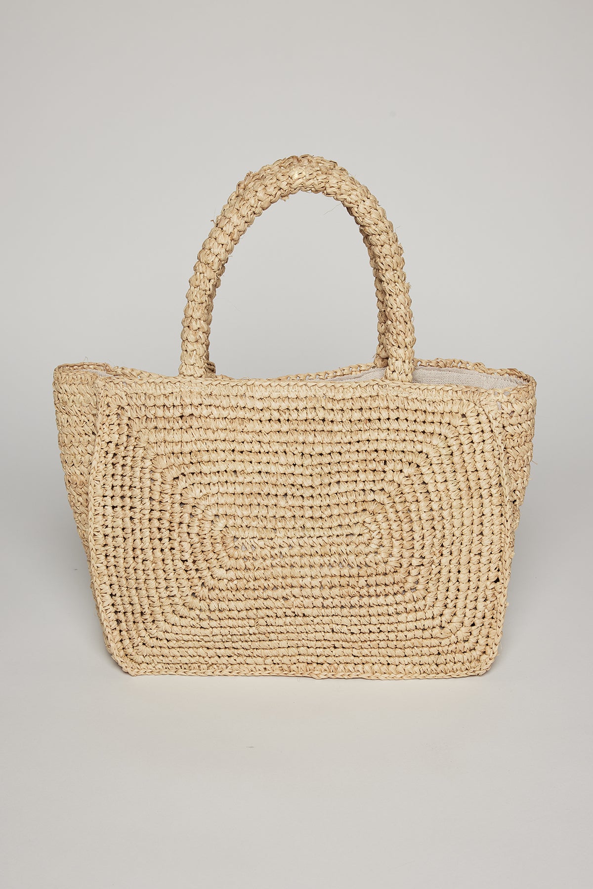 TINA STRAW TOTE BAG by Velvet by Graham & Spencer, with a rectangular shape and sturdy handles, displayed against a neutral background.-36571459059905