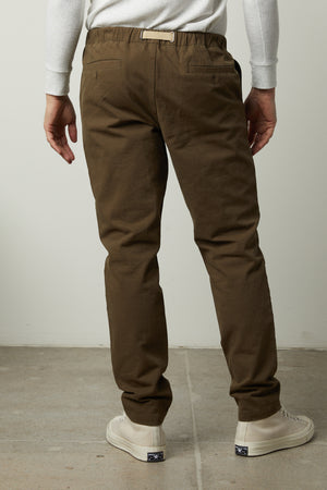 The back view of a man wearing Velvet by Graham & Spencer's MORAN COTTON TWILL PANT.