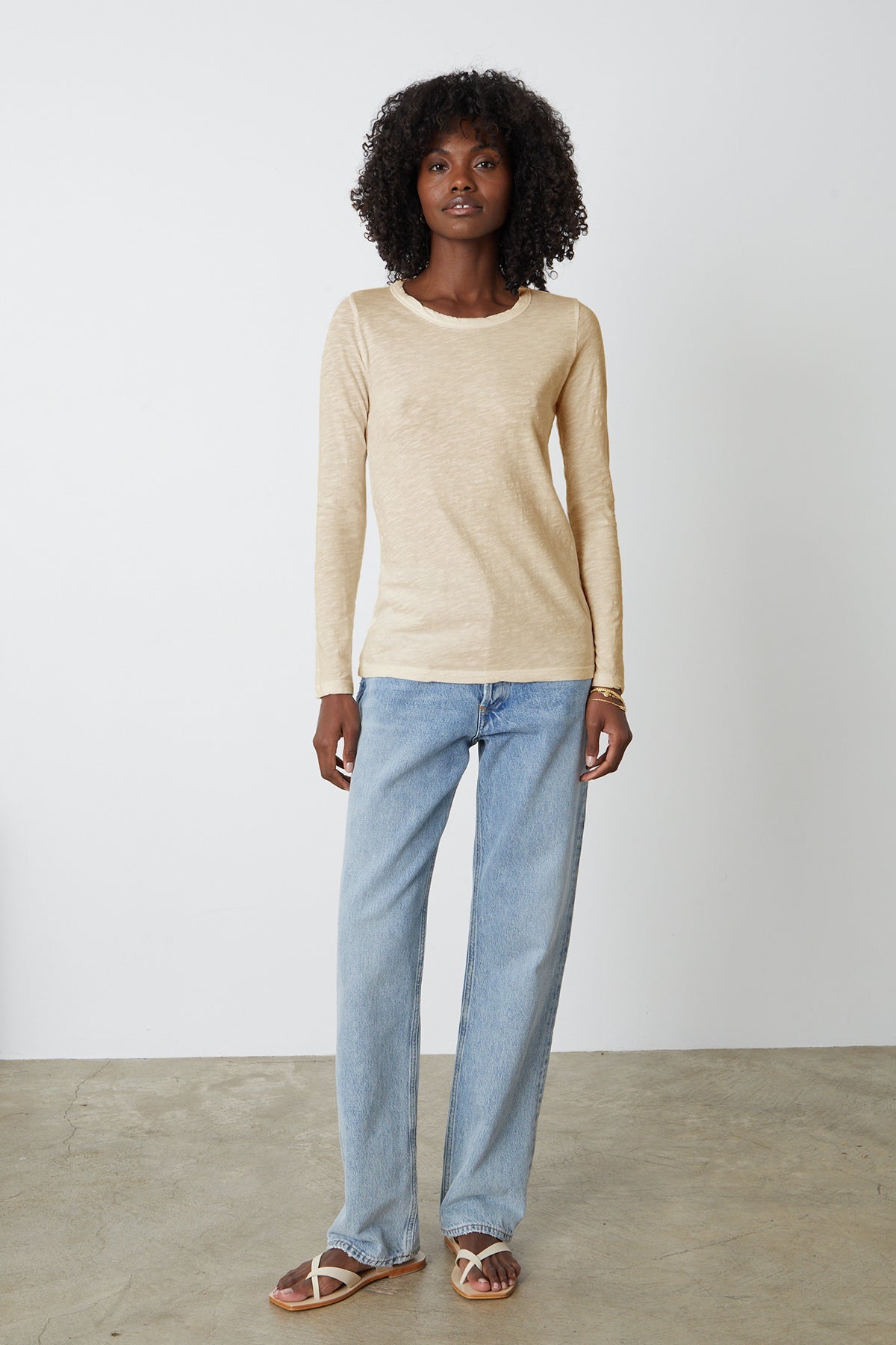   Lizzie long sleeve tee in sesame with light blue denim and flat sandals full length front 