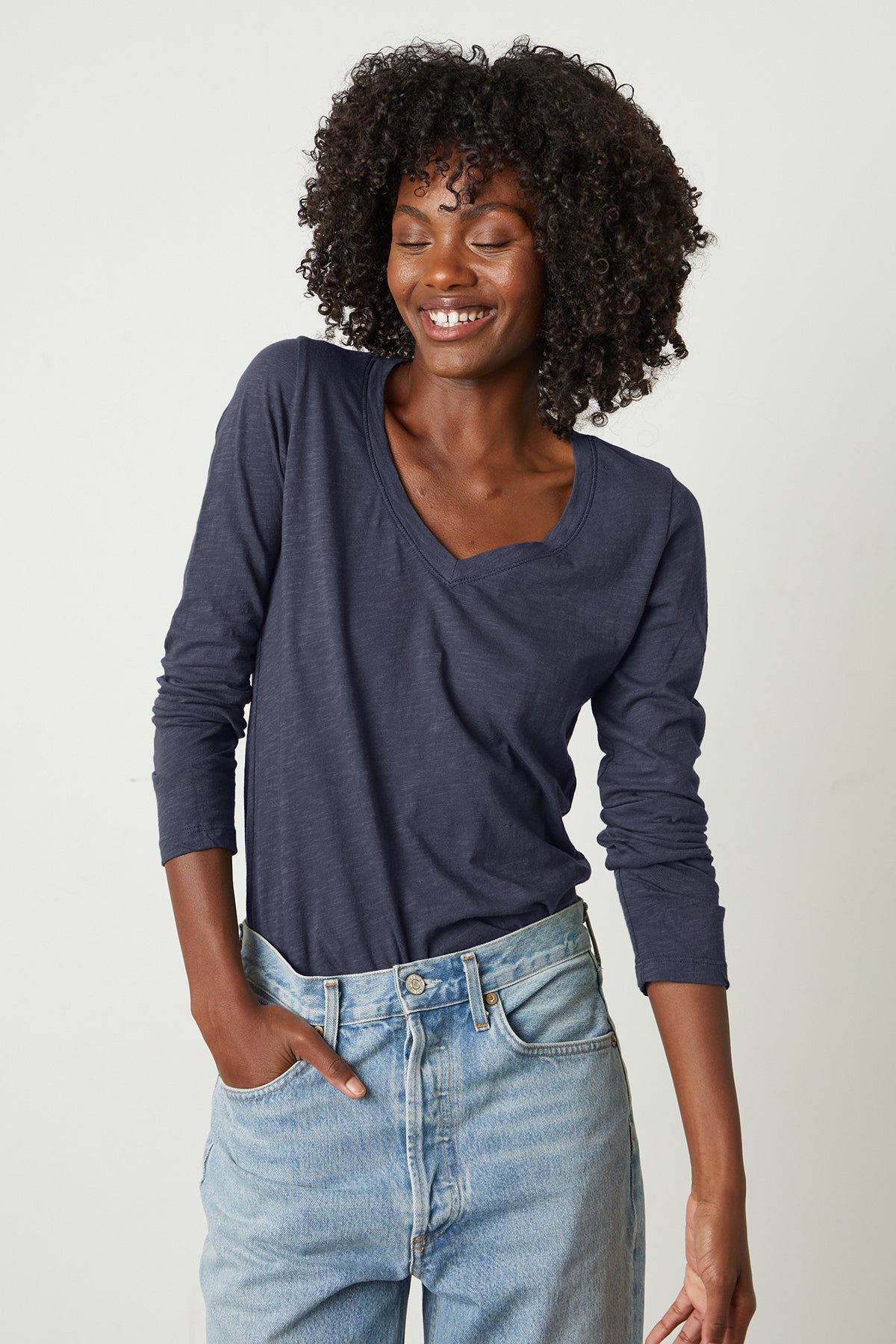 Blaire Original Slub Long Sleeve Tee in crater blue tucked into light blue denim close up front-26630140854465