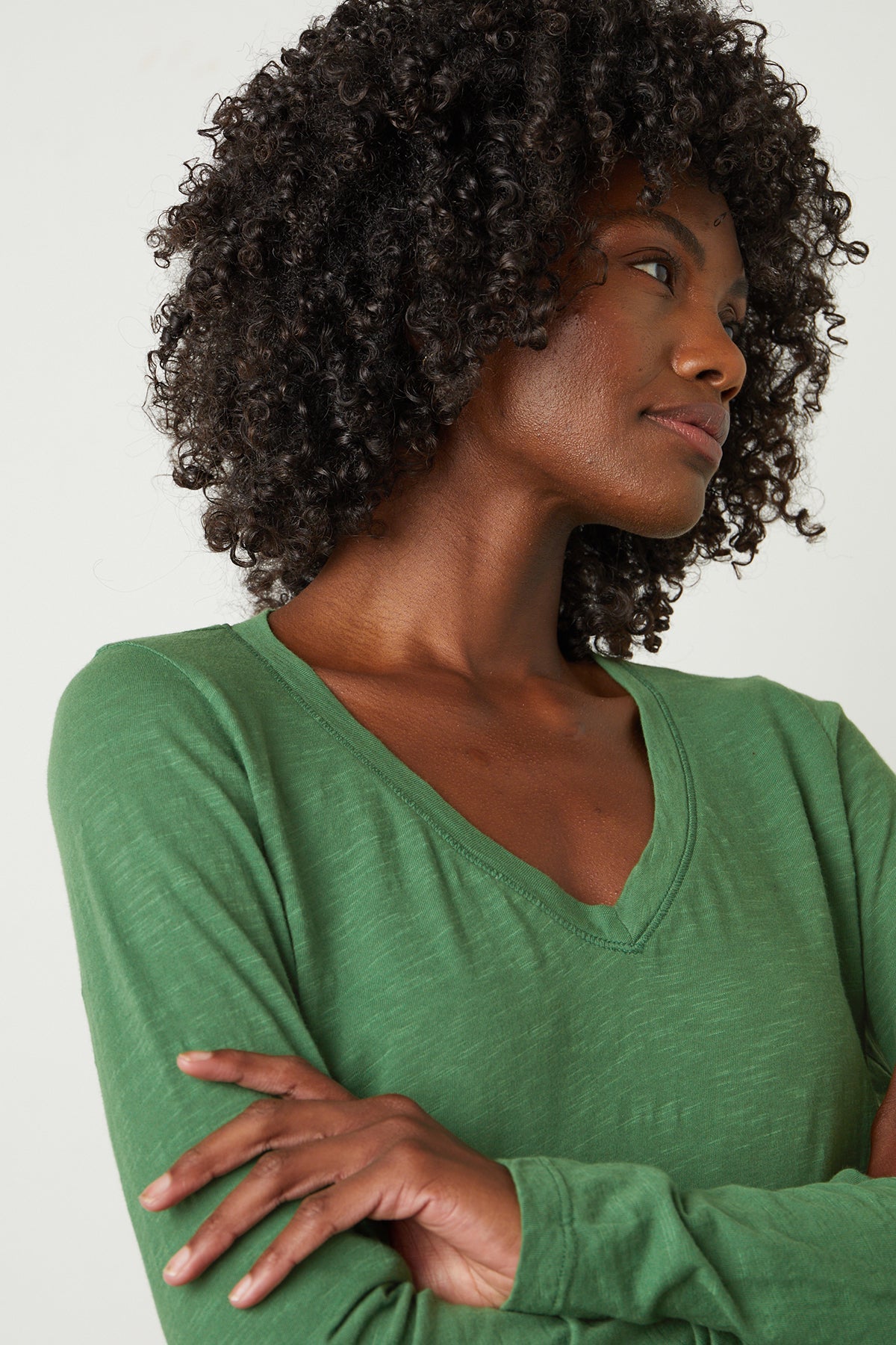 a woman wearing a green Velvet by Graham & Spencer Blaire Original Slub Tee.-26630140788929