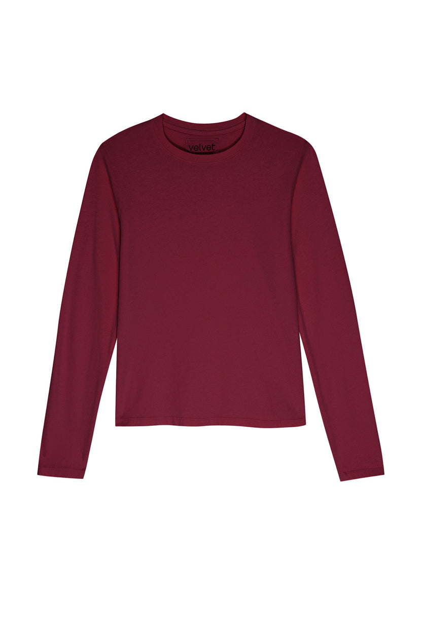 The Velvet by Jenny Graham VICENTE TEE, a maroon, long-sleeved crew neck with a relaxed fit, is laid flat against a white background.