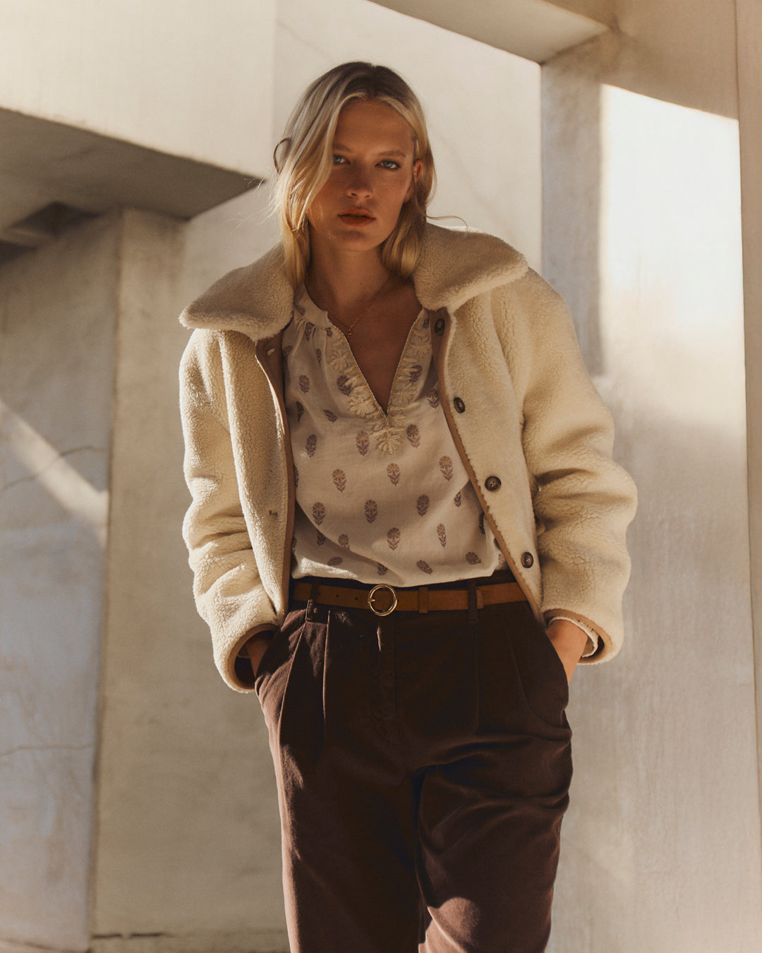 A woman wearing the Amara Jacket in Sand by Velvet by Graham & Spencer.