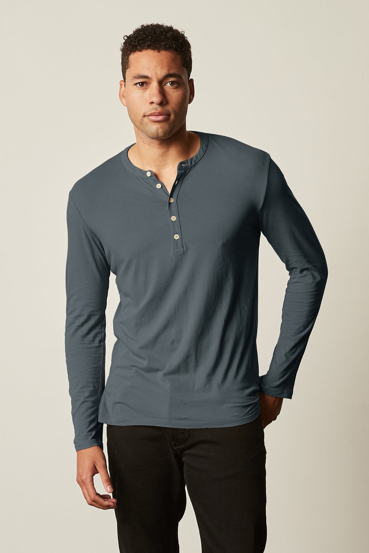 a man wearing a grey Velvet by Graham & Spencer ALVARO COTTON JERSEY HENLEY t-shirt.-26629718311105