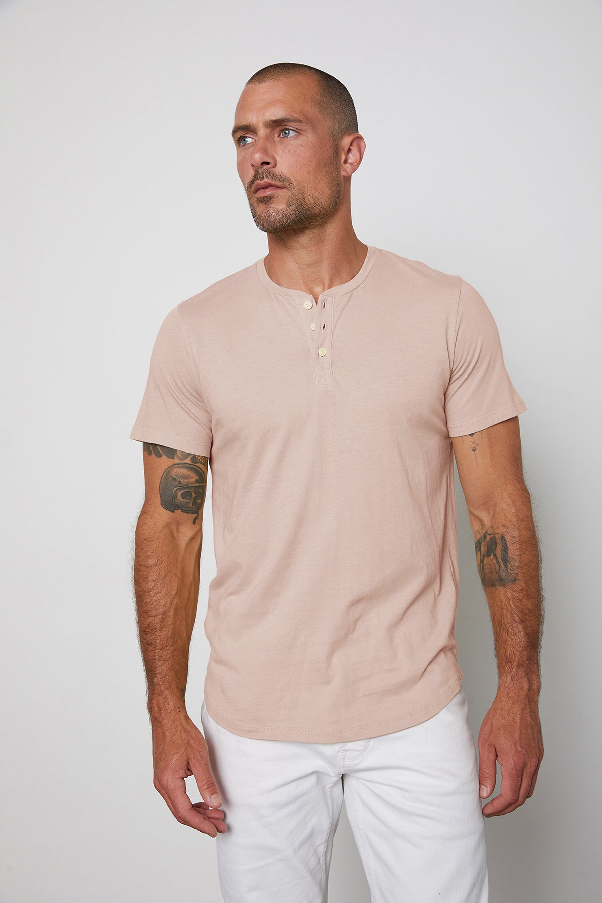 Fulton Short Sleeve Henley in light pink color bloom with white pants front view-35567477162177