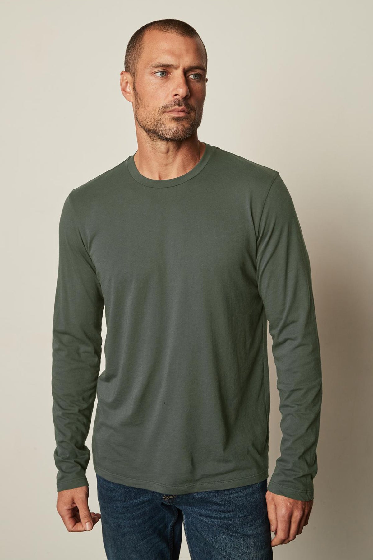 Skeeter Crew Neck Long Sleeve Tee in olive with blue denim front-26684904210625