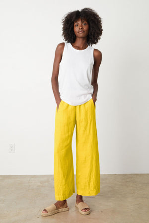 Lola pant in bright yellow sun colored linen with Maxie tank in white full length front