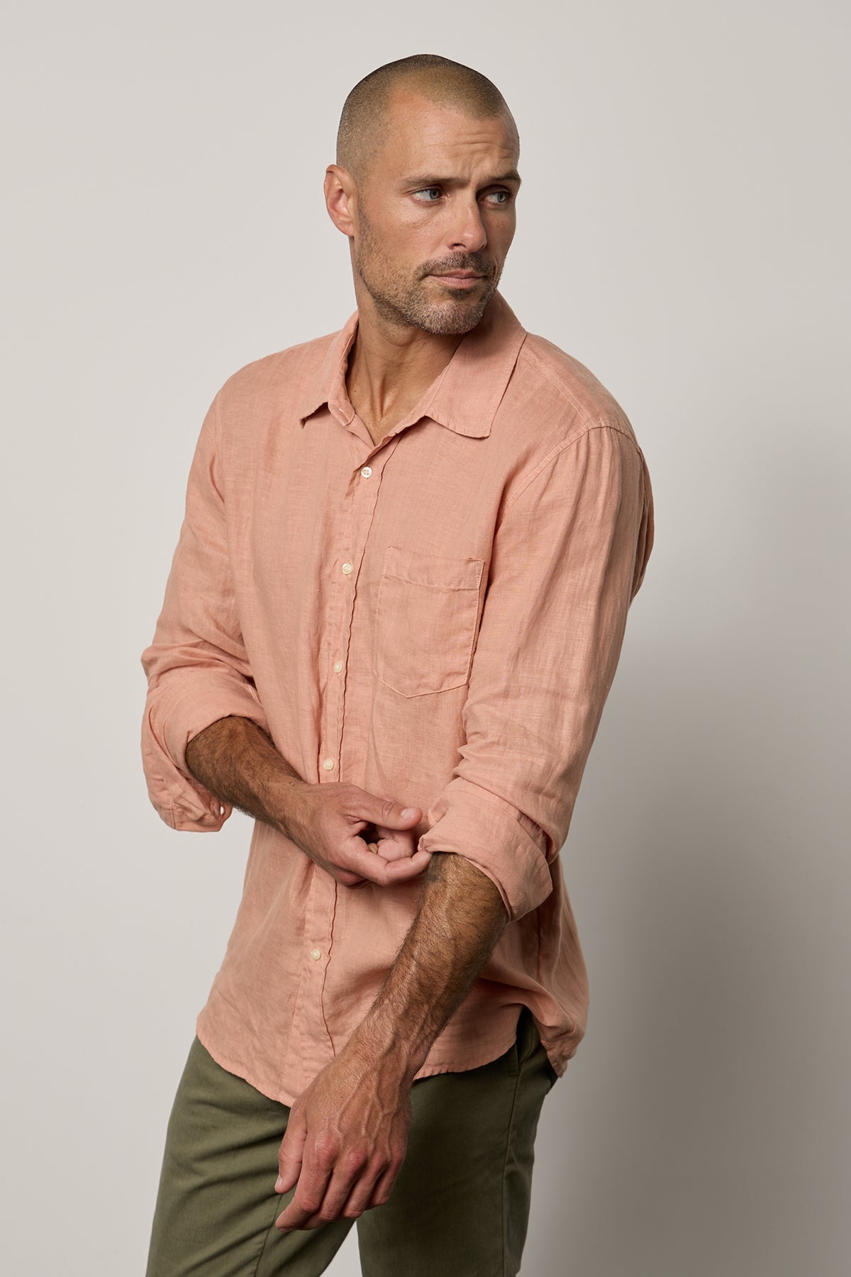   Benton Button-Up Shirt in bronze linen with sleeves rolled front & side 