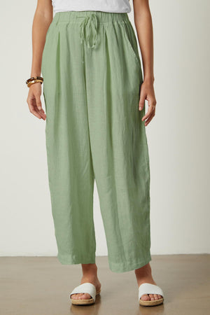 A woman wearing the Hannah Linen Wide Leg Pant by Velvet by Graham & Spencer.