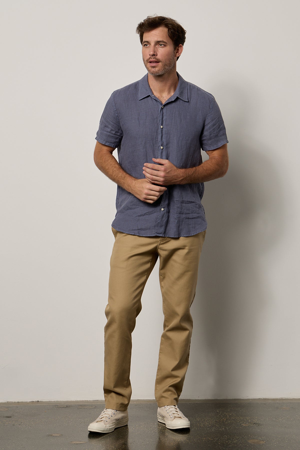   Mackie Button-Up Shirt in baltic blue linen with Aiden pants in khaki full length front 