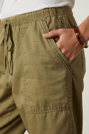 Misty Pant in forest twill front close up and pocket detail