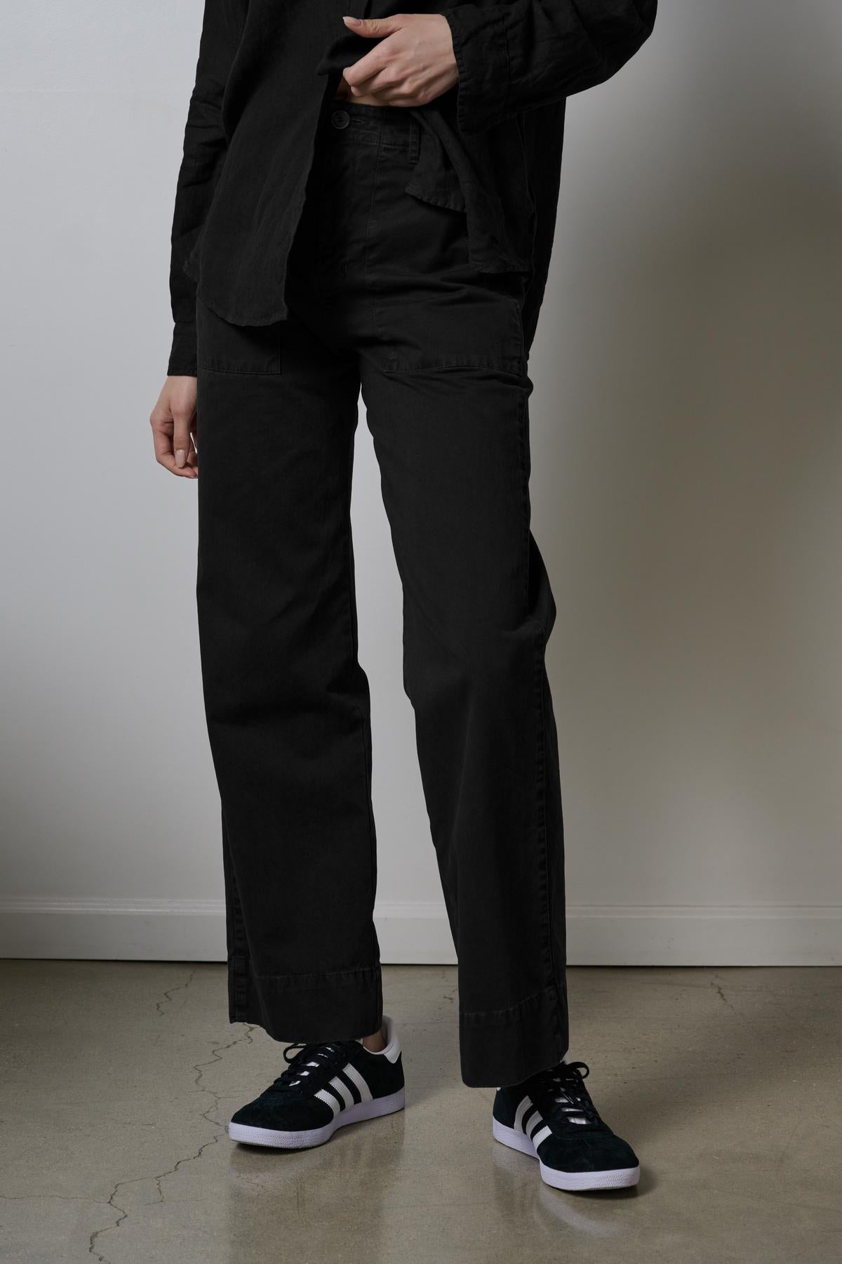 A woman wearing Velvet by Jenny Graham's VENTURA PANTS and a white shirt.-35783209746625