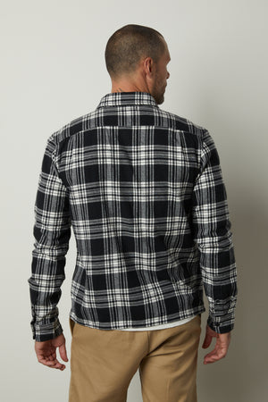 The back view of a man wearing a Velvet by Graham & Spencer FREDDY PLAID SHIRT.