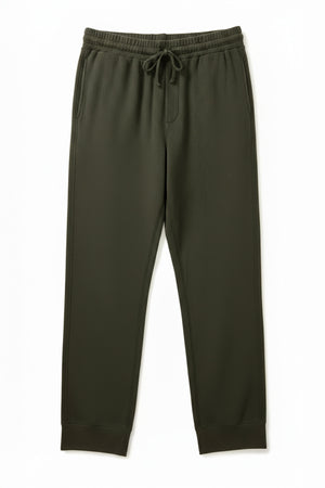 The ZEALAND SWEATPANT by Velvet by Graham & Spencer is a dark green, ultra-soft pant featuring an elasticized drawstring waist and side pockets, shown laid flat on a white background.