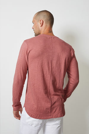 the back view of a man wearing a Velvet by Graham & Spencer CHANCE CREW NECK TEE.