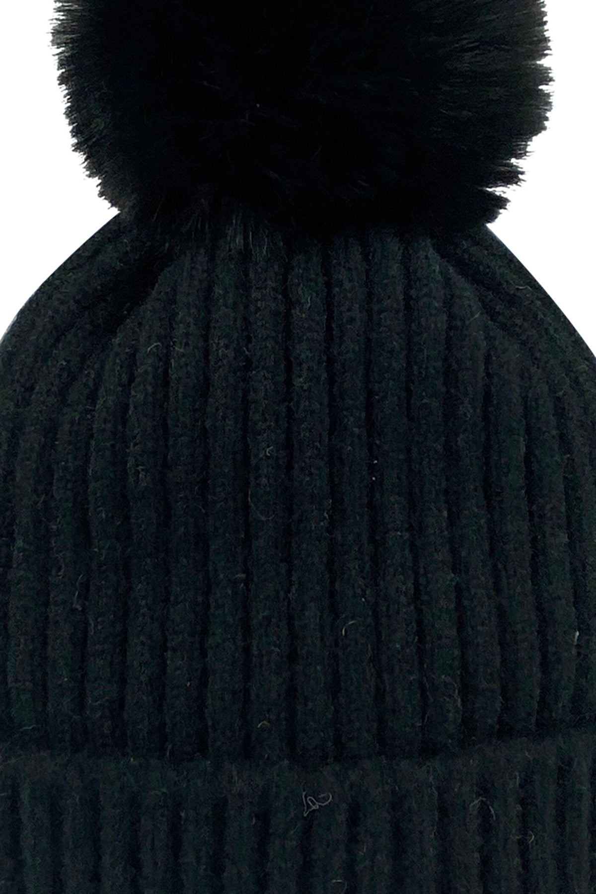   A Velvet by Graham & Spencer CITY BEANIE WITH FAUX POM. 