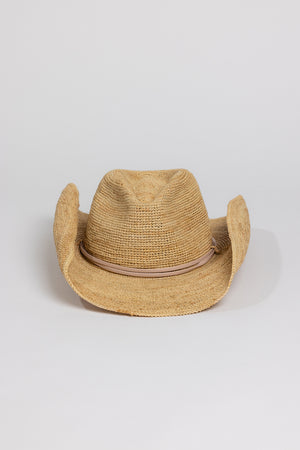 A RAFFIA CROCHET COWBOY HAT with western charm on a white background, by Velvet by Graham & Spencer.