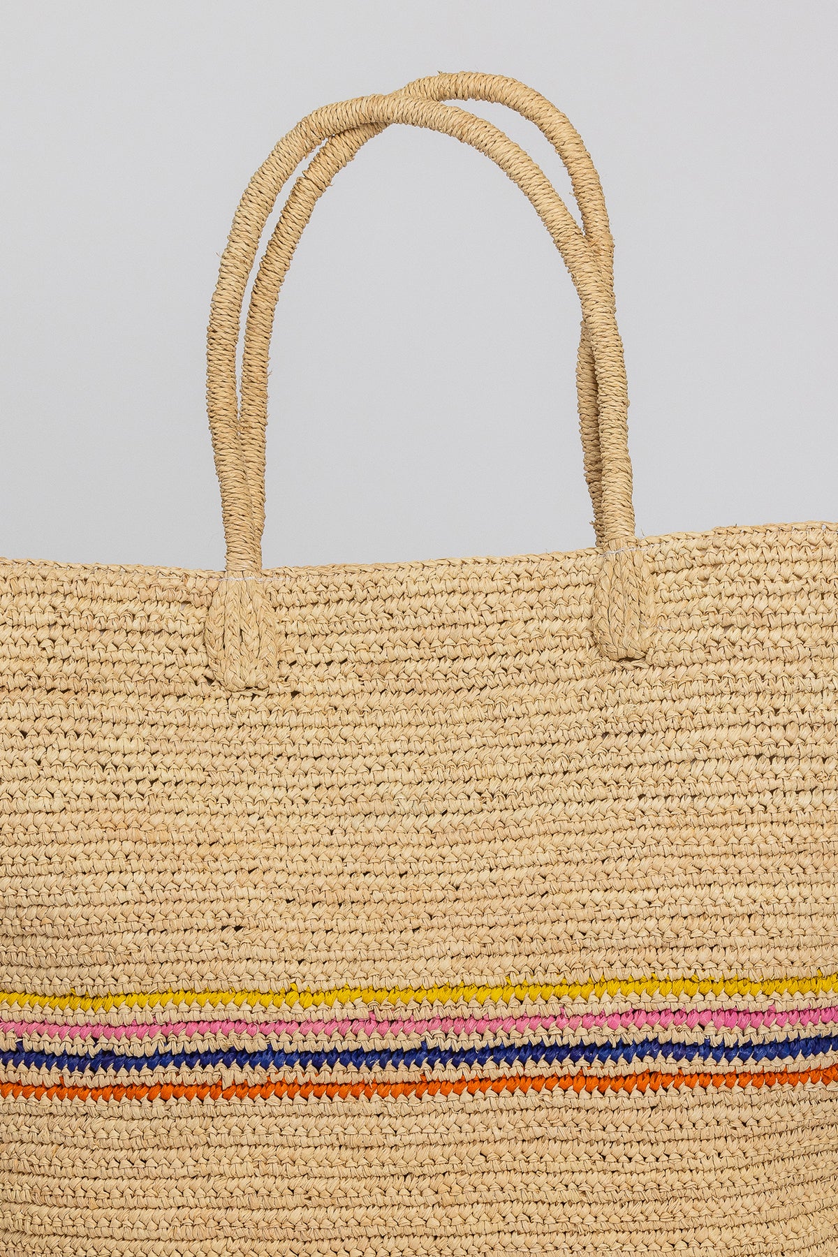 A lightweight IRIS TOTE by Velvet by Graham & Spencer with a colorful stripe, perfect for packing.-26166356181185